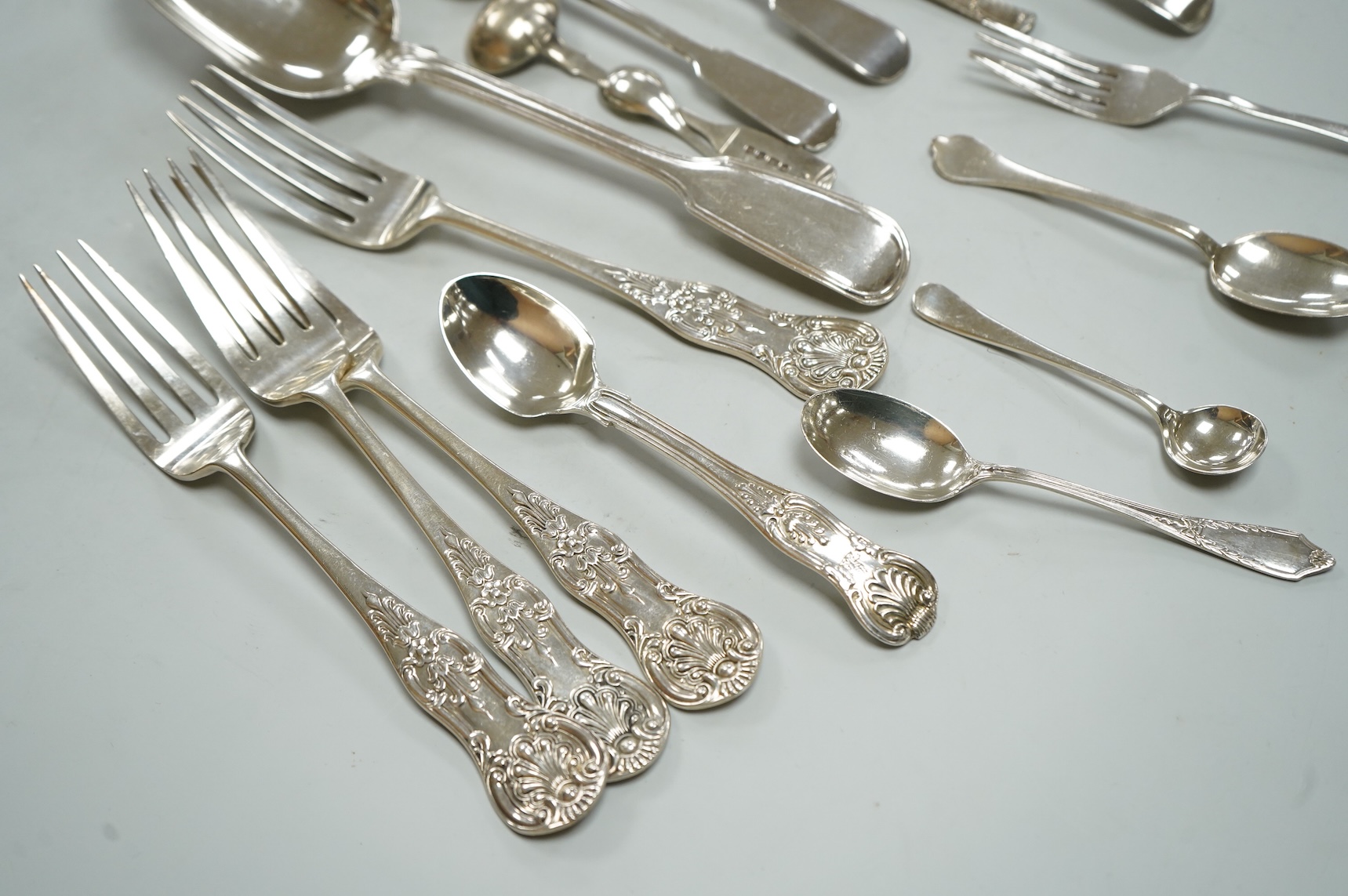 A collection of assorted Victorian and later silver flatware, various patterns, dates and makers, 17.2oz.